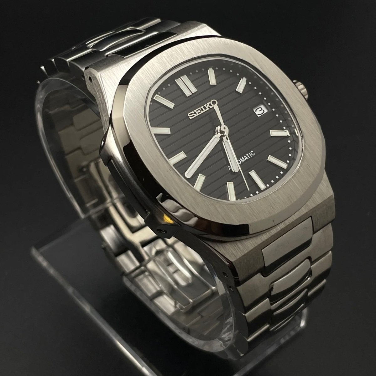 Nautilus Mod Silver Black Dial silver and black Seiko mod style watch with NH35 automatic movement by ModTime - case and bracelet detail