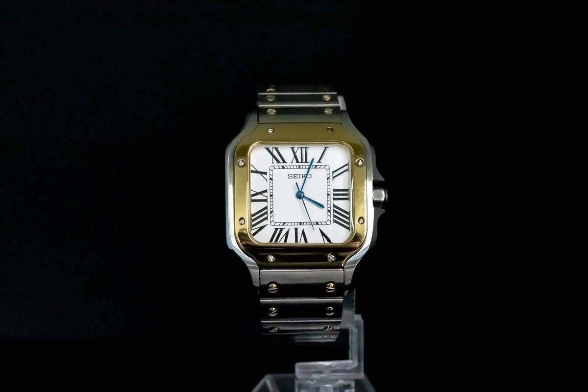 Montre automatique ModTime de style Santos — configuration bicolore et blanche (NH38), cadran blanc, chiffres romains, sur un support