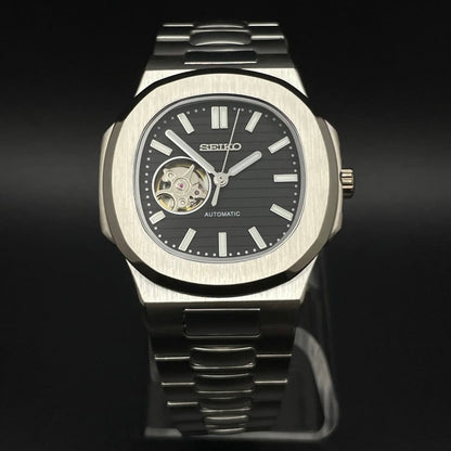Nautilus Mod Silver Black Open Heart Dial silver and black Seiko mod style watch with NH38 open-heart movement by ModTime - angled dial view
