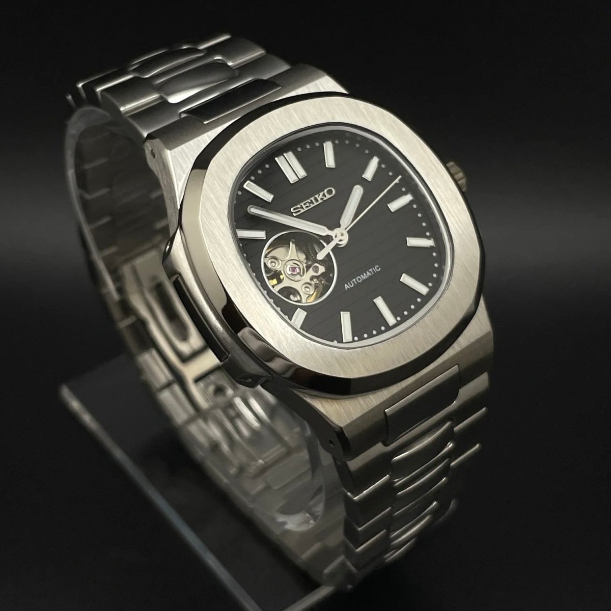 Nautilus Mod Silver Black Open Heart Dial silver and black Seiko mod style watch with NH38 open-heart movement by ModTime - case and bracelet detail