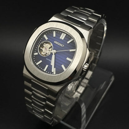 Nautilus Mod Silver Blue Open Heart Dial silver and blue Seiko mod style watch with NH38 open-heart movement by ModTime - dial detail
