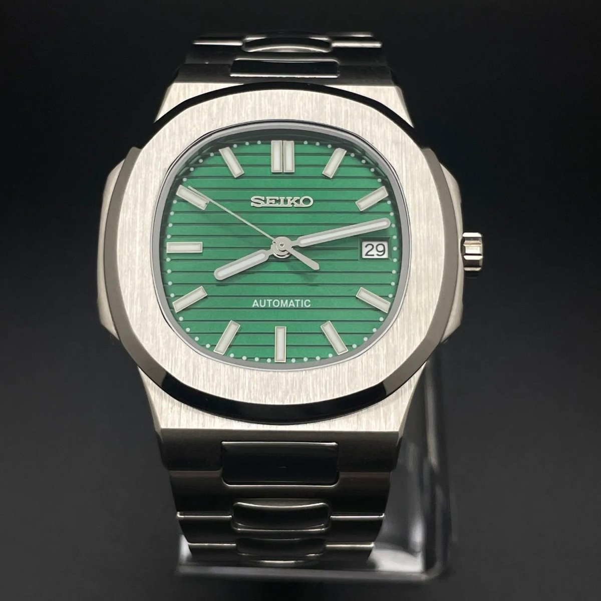 Nautilus Mod Silver Emerald Green Dial silver and green Seiko mod style watch with NH35 automatic movement by ModTime - angled dial view