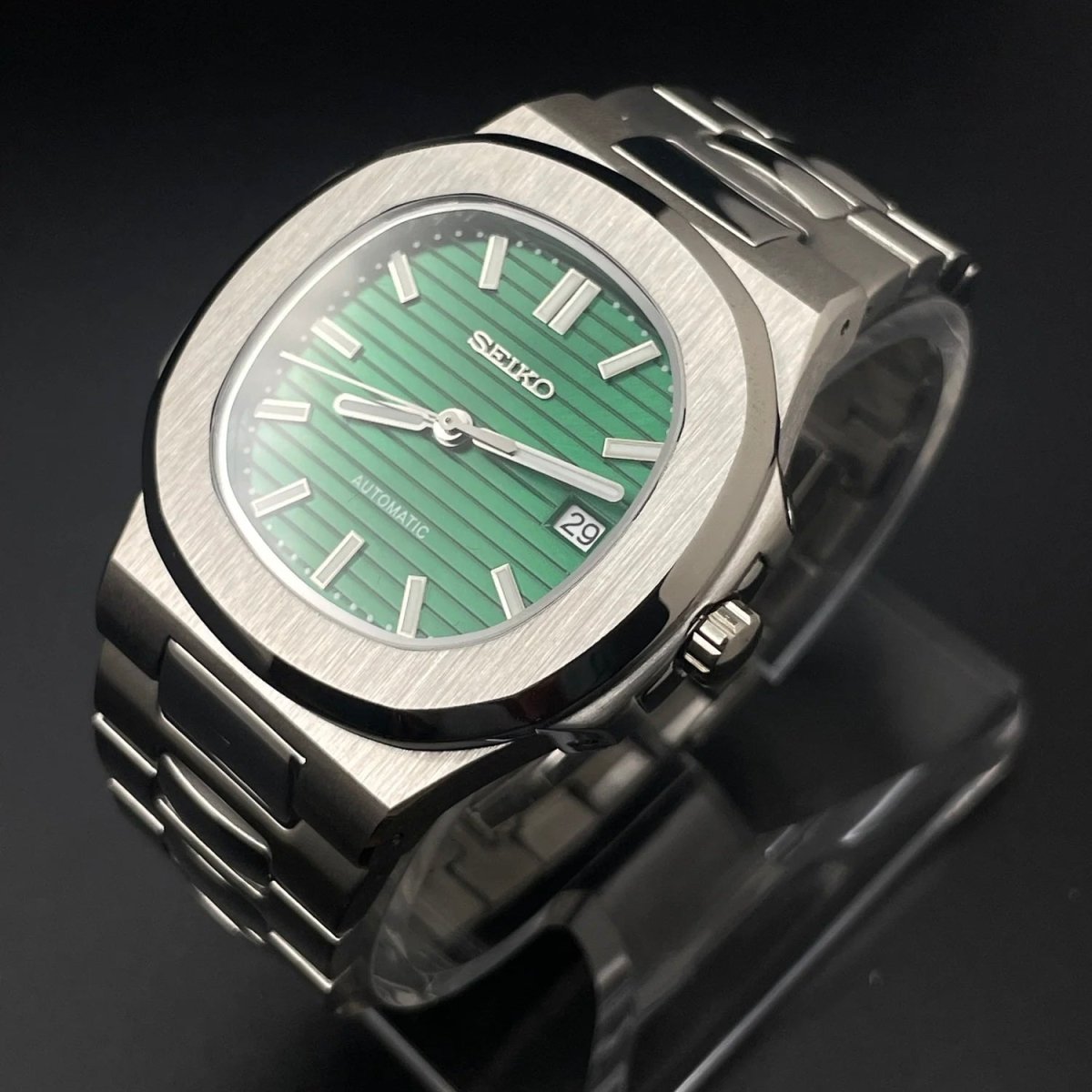 Nautilus Mod Silver Emerald Green Dial silver and green integrated bracelet Seiko mod style watch with NH35 automatic movement by ModTime - dial detail