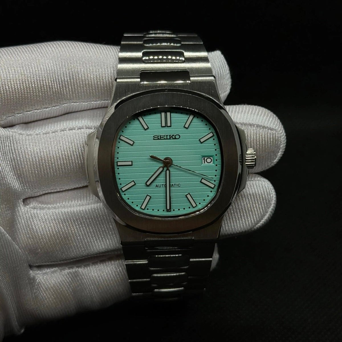 Nautilus Mod Silver Tiffany Blue Dial silver and blue integrated bracelet Seiko mod style watch with NH35 automatic movement by ModTime - side profile