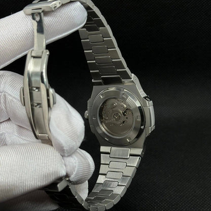 ModTime Nautilus-style Silver Skeleton listing (NH38): silver-tone caseback, rotor marked NH35A, open-bracelet rear view