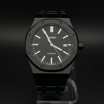 Seiko Mod Royal Oak Style All Black Dial black integrated bracelet Seiko mod style watch with NH35 automatic movement by ModTime - angled dial view