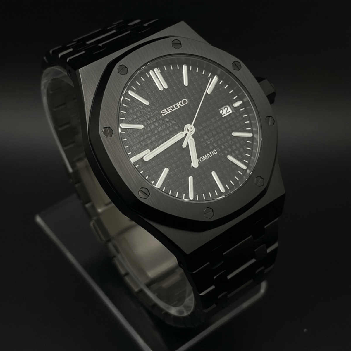 Seiko Mod Royal Oak Style All Black Dial black integrated bracelet Seiko mod style watch with NH35 automatic movement by ModTime - case and bracelet detail