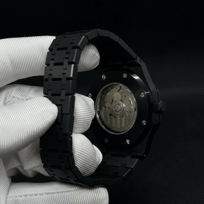Seiko Mod Royal Oak Style All Black Dial black integrated bracelet Seiko mod style watch with NH35 automatic movement by ModTime - side profile
