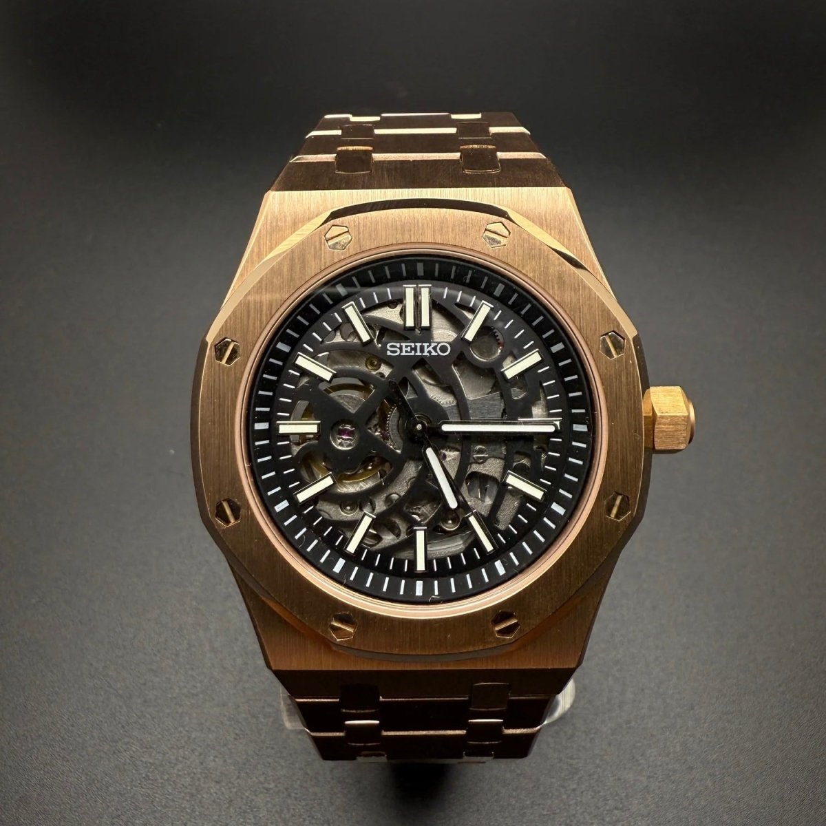 Royal Oak Mod Rose Gold Skeleton Dial rose gold and gold Seiko mod style watch with NH70 skeleton movement by ModTime - angled dial view