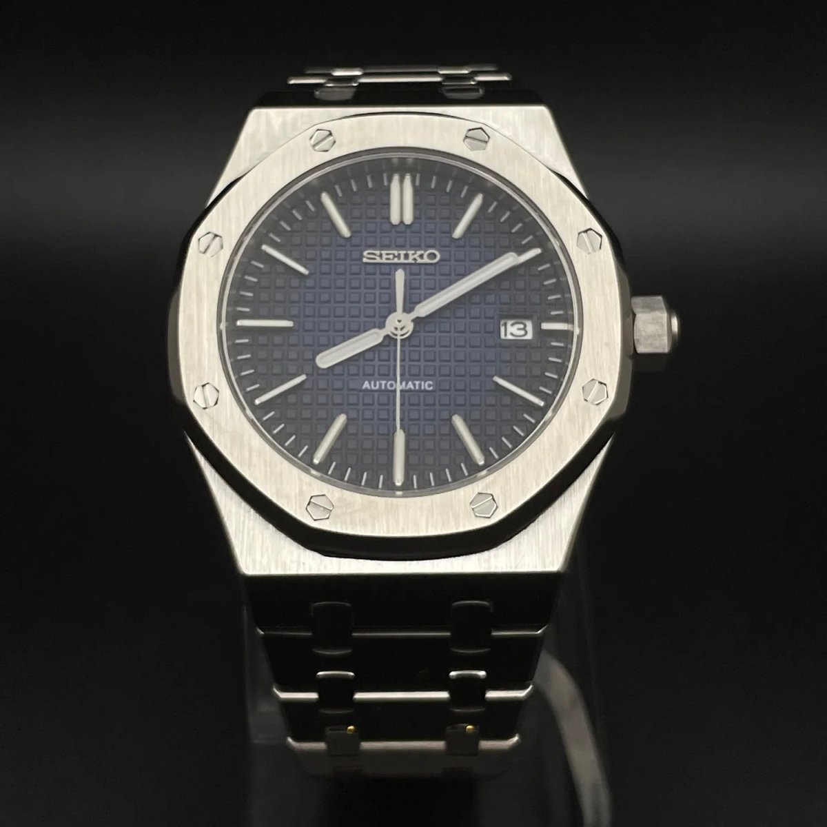Royal Oak Mod Silver Ocean Blue Dial silver and blue integrated bracelet Seiko mod style watch with NH35 automatic movement by ModTime - angled dial view