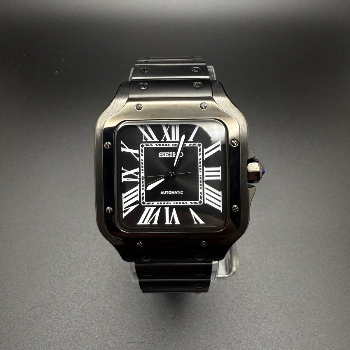 Santos Mod All Black black Seiko mod style watch with NH35 automatic movement by ModTime - angled dial view